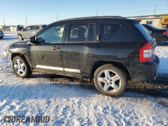 ✅ 2009 Jeep Compass Limited • VIN: 1J4FF57B69D221230 • Lot: 45108345. Listed on Copart with 137,636 mi. Free auction sales archive from the USA and detailed vehicle history report at DreamBid. Image 2.