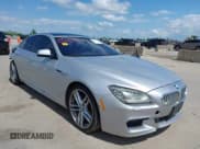 ✅ 2015 BMW 6 Series 650i • VIN: WBA6B2C55FGB99196 • Lot: 42107698. Listed on IAAI with 74,393 mi. Free auction sales archive from the USA and detailed vehicle history report at DreamBid. Image 1.