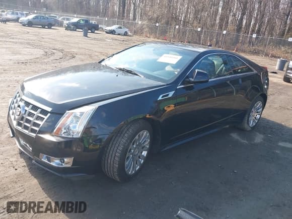 ✅ 2014 Cadillac CTS Premium • VIN: 1G6DH1E32E0177775 • Lot: 41540366. Listed on IAAI with 106,398 mi. Free auction sales archive from the USA and detailed vehicle history report at DreamBid. Image 2.