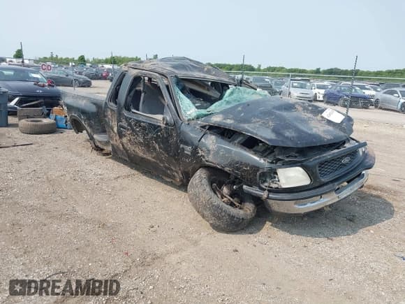 ✅ 1998 Ford F-150 XL • VIN: 1FTRX08L5WKC13654 • Lot: 42402628. Listed on IAAI with 128,541 mi. Free auction sales archive from the USA and detailed vehicle history report at DreamBid. Image 1.