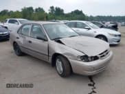 ✅ 1999 Toyota Corolla VE • VIN: 2T1BR12E2XC142458 • Lot: 42879723. Listed on IAAI with 140,141 mi. Free auction sales archive from the USA and detailed vehicle history report at DreamBid. Image 1.