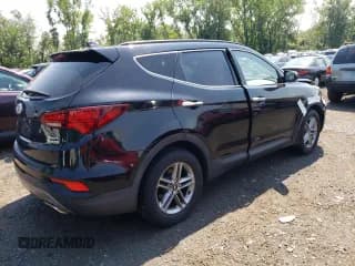 ✅ 2017 Hyundai Santa Fe 2.4L • VIN: 5XYZUDLB0HG458241 • Лот: 63053374. Опубликован ранее на Copart с пробегом Не указан. Бесплатный доступ к архиву аукционных продаж из США и подробный отчёт об истории автомобиля на DreamBid. Изображение 3.