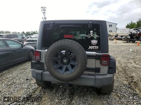 ✅ 2015 Jeep Wrangler Unlimited Freedom • VIN: 1C4BJWDG6FL699383 • Лот: 64408675. Опубликован ранее на Copart с пробегом 204 981 миль. Бесплатный доступ к архиву аукционных продаж из США и подробный отчёт об истории автомобиля на DreamBid. Изображение 6.