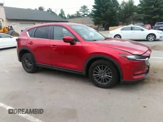 ✅ 2021 Mazda CX-5 Touring • VIN: JM3KFBCMXM1303358 • Lot: 42829675. Wystawiony na IAAI z przebiegiem 53 848 mil. Bezpłatny archiwum sprzedaży aukcyjnych z USA i szczegółowy raport historii pojazdu na DreamBid. Zdjęcie 1.