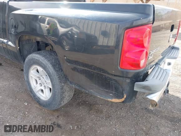 2006 Dodge Dakota SLT with VIN 1D7HE48NX6S596684, listed as a IAAI auction lot 41992956 with 255,526 mi miles and . Bid and sale history available at DreamBid. Image 6.