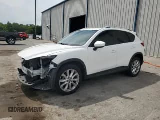 ✅ 2015 Mazda CX-5 Grand Touring • VIN: JM3KE2DY6F0459488 • Lot: 65322045. Wystawiony na Copart z przebiegiem 207 972 mil. Bezpłatny archiwum sprzedaży aukcyjnych z USA i szczegółowy raport historii pojazdu na DreamBid. Zdjęcie 1.