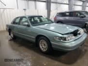 ✅ 1997 Ford Crown Victoria LX • VIN: 2FALP74W8VX231100 • Lot: 46806545. Listed on Copart with 156,739 mi. Free auction sales archive from the USA and detailed vehicle history report at DreamBid. Image 4.