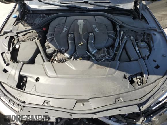 ✅ 2018 BMW 7 Series 750i • VIN: WBA7F0C5XJGM23016 • Лот: 51284255. Опубликован ранее на Copart с пробегом 69 460 миль. Бесплатный доступ к архиву аукционных продаж из США и подробный отчёт об истории автомобиля на DreamBid. Изображение 13.