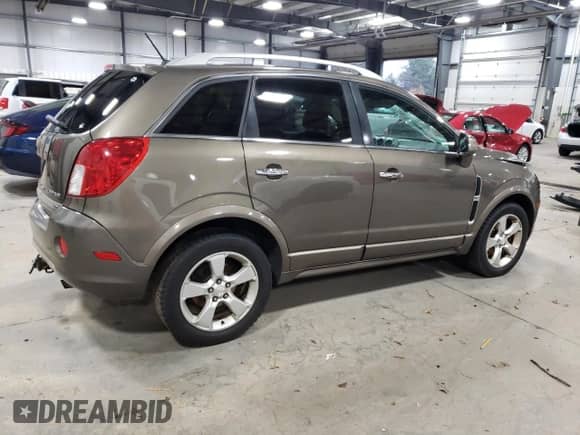 2014 Chevrolet Captiva Sport LTZ с VIN 3GNAL4EK9ES652863, выставлен на аукционе Copart как лот 79065974 с пробегом 159 887 миль миль и Списание • Salvage title. История ставок и продаж доступна на DreamBid. Изображение 3.