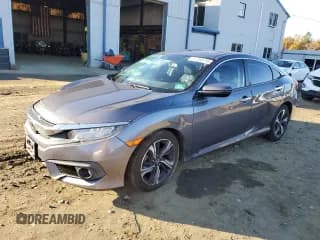 ✅ 2017 Honda Civic Touring • VIN: 19XFC1F96HE203605 • Lot: 87383745. Listed on Copart with 92,294 mi. Free auction sales archive from the USA and detailed vehicle history report at DreamBid. Image 1.