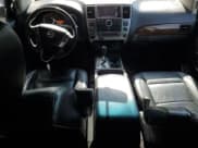 ✅ 2015 Nissan Armada Platinum • VIN: 5N1AA0NC6FN610920 • Lot: 64297935. Listed on Copart with 114,631 mi. Free auction sales archive from the USA and detailed vehicle history report at DreamBid. Image 8.