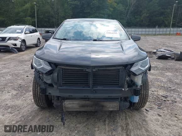 2018 Chevrolet Equinox LT z VIN 2GNAXSEV6J6235860, wystawiony jako IAAI lot #43064393 z przebiegiem 85 653 mil mil oraz . Historia ofert i sprzedaży dostępna na DreamBid. Obrazek 13.