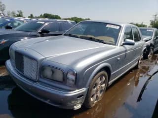 ✅ 2001 Bentley Arnage • VIN: SCBLC31E11CX06414 • Lot: 59017875. Wystawiony na Copart z przebiegiem 70 860 mil. Bezpłatny archiwum sprzedaży aukcyjnych z USA i szczegółowy raport historii pojazdu na DreamBid. Zdjęcie 1.