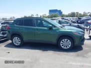 ✅ 2023 Toyota Corolla Cross LE • VIN: 7MUCAAAG3PV042624 • Lot: 42506895. Listed on IAAI with 28,039 mi. Free auction sales archive from the USA and detailed vehicle history report at DreamBid. Image 13.