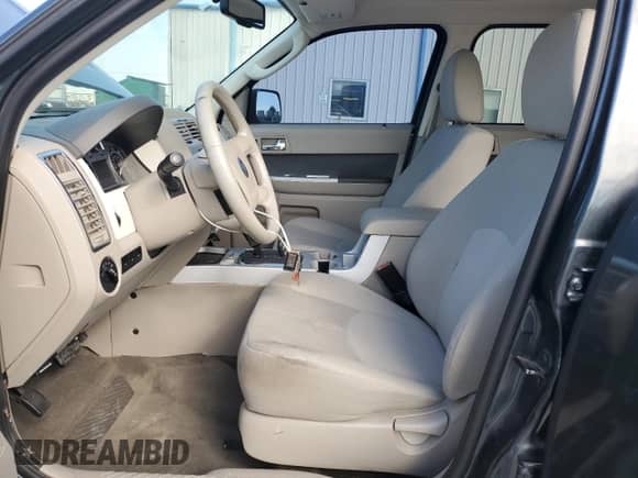 2009 Mercury Mariner с VIN 4M2CU81749KJ01405, выставлен на аукционе Copart как лот 82547795 с пробегом 133 000 миль миль и Списание • Salvage title. История ставок и продаж доступна на DreamBid. Изображение 7.