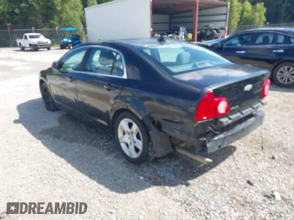 2012 Chevrolet Malibu 1LS z VIN 1G1ZB5E02CF301242, wystawiony jako IAAI lot #43411361 z przebiegiem 158 844 mil mil oraz . Historia ofert i sprzedaży dostępna na DreamBid. Obrazek 3.