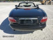 ✅ 2003 Jaguar XK • VIN: SAJDA42C232A32216 • Lot: 80443254. Wystawiony na Copart z przebiegiem Nie podano. Bezpłatny archiwum sprzedaży aukcyjnych z USA i szczegółowy raport historii pojazdu na DreamBid. Zdjęcie 6.