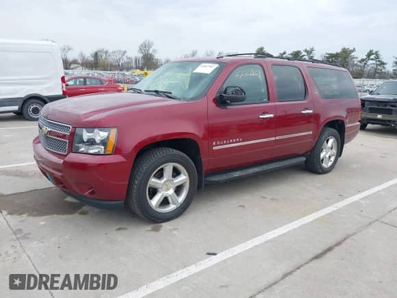 2009 Chevrolet Suburban LTZ with VIN 1GNFK36309J105434, listed as a IAAI auction lot 42062907 with 132,674 mi miles and . Bid and sale history available at DreamBid. Image 20.