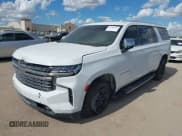 ✅ 2023 Chevrolet Suburban Premier • VIN: 1GNSKFKD5PR334706 • Lot: 43280982. Wystawiony na IAAI z przebiegiem 76 977 mil. Bezpłatny archiwum sprzedaży aukcyjnych z USA i szczegółowy raport historii pojazdu na DreamBid. Zdjęcie 2.