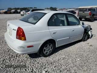 2005 Hyundai Accent GLS с VIN KMHCG45C55U616484, выставлен на аукционе Copart как лот 81498465 с пробегом 34 578 миль миль и Списание • Salvage title. История ставок и продаж доступна на DreamBid. Изображение 3.