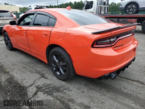 2021 Dodge Charger SXT с VIN 2C3CDXJG2MH519997, выставлен на аукционе Copart как лот 69466015 с пробегом 65 742 миль миль и Списание • Salvage title. История ставок и продаж доступна на DreamBid. Изображение 2.