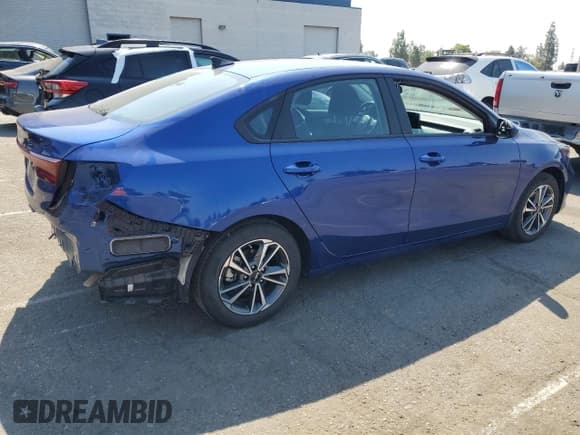 ✅ 2023 Kia Forte LXS • VIN: 3KPF24AD4PE578875 • Лот: 70065645. Опубликован ранее на Copart с пробегом 34 291 миль. Бесплатный доступ к архиву аукционных продаж из США и подробный отчёт об истории автомобиля на DreamBid. Изображение 3.