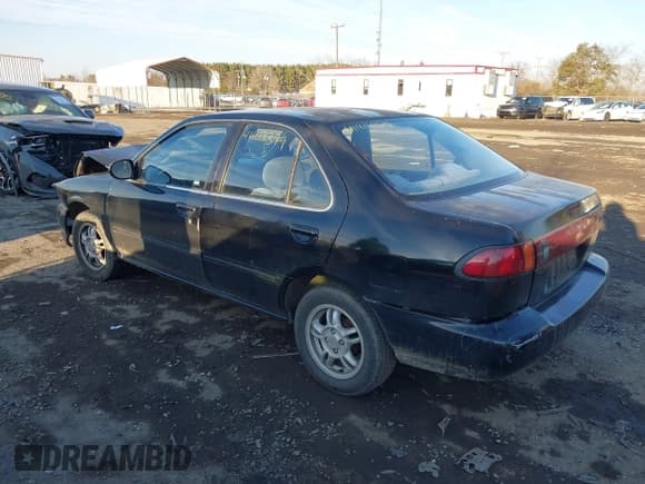 ✅ 1999 Nissan Sentra XE • VIN: 3N1AB41D3XL091952 • Lot: 41414379. Listed on IAAI with 101,280 mi. Free auction sales archive from the USA and detailed vehicle history report at DreamBid. Image 3.