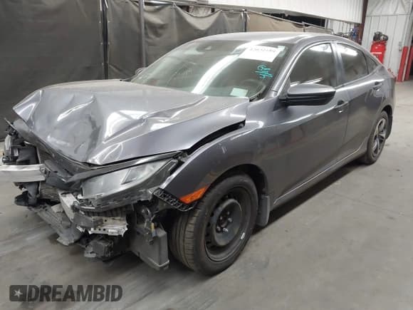 ✅ 2020 Honda Civic LX • VIN: 19XFC2F67LE006057 • Lot: 42032759. Listed on IAAI with 119,319 mi. Free auction sales archive from the USA and detailed vehicle history report at DreamBid. Image 18.