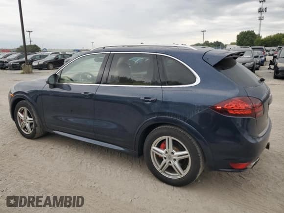 ✅ 2014 Porsche Cayenne GTS • VIN: WP1AD2A20ELA72888 • Lot: 69849105. Listed on Copart with 127,394 mi. Free auction sales archive from the USA and detailed vehicle history report at DreamBid. Image 2.