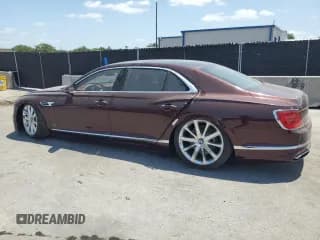 ✅ 2021 Bentley Flying Spur W12 • VIN: SCBBB6ZG9MC084879 • Lot: 54848205. Wystawiony na Copart z przebiegiem Nie podano. Bezpłatny archiwum sprzedaży aukcyjnych z USA i szczegółowy raport historii pojazdu na DreamBid. Zdjęcie 2.