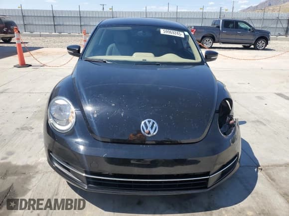 ✅ 2014 Volkswagen Beetle 2.0L TDI w/Sun/Sound/Nav • VIN: 3VWJL7AT6EM646352 • Лот: 59969245. Опубликован ранее на Copart с пробегом 71 078 миль. Бесплатный доступ к архиву аукционных продаж из США и подробный отчёт об истории автомобиля на DreamBid. Изображение 5.