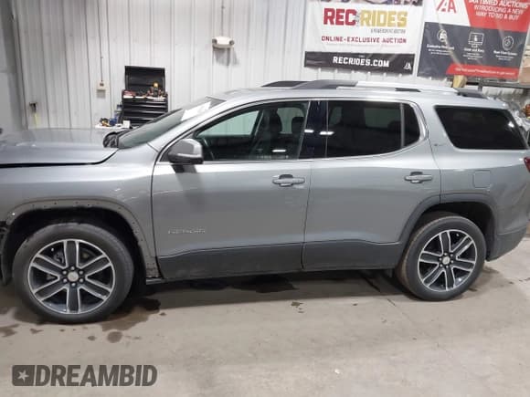 ✅ 2023 GMC Acadia SLT • VIN: 1GKKNULS1PZ191310 • Lot: 43578298. Listed on IAAI with 48,593 mi. Free auction sales archive from the USA and detailed vehicle history report at DreamBid. Image 15.