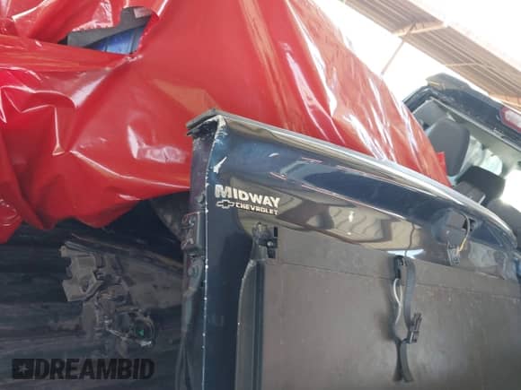 2021 Chevrolet Silverado 1500 LT z VIN 3GCUYDETXMG339497, wystawiony jako IAAI lot #41615456 z przebiegiem Nie podano mil oraz . Historia ofert i sprzedaży dostępna na DreamBid. Obrazek 11.