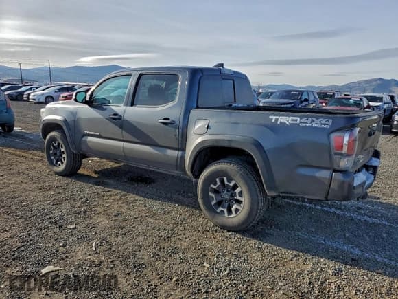 ✅ 2022 Toyota Tacoma TRD Off Road • VIN: 3TMCZ5AN3NM501057 • Lot: 94573005. Listed on Copart with 53,316 mi. Free auction sales archive from the USA and detailed vehicle history report at DreamBid. Image 2.