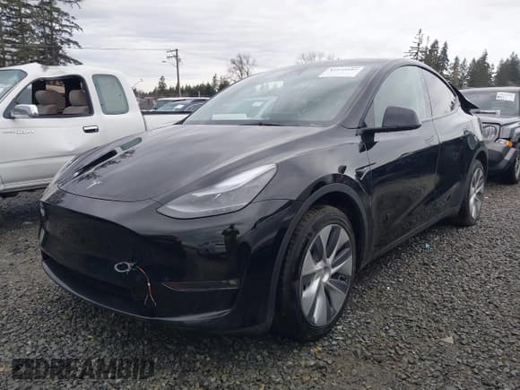✅ 2023 Tesla Model Y Long Range • VIN: 7SAYGAEE2PF905136 • Lot: 41572597. Listed on IAAI with 33,425 mi. Free auction sales archive from the USA and detailed vehicle history report at DreamBid. Image 19.
