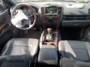 ✅ 2003 Kia Sorento LX • VIN: KNDJC733435112026 • Lot: 55754645. Wystawiony na Copart z przebiegiem 164 586 mil. Bezpłatny archiwum sprzedaży aukcyjnych z USA i szczegółowy raport historii pojazdu na DreamBid. Zdjęcie 8.