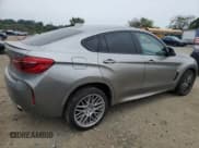 ✅ 2016 BMW X6 M • VIN: 5YMKW8C59G0R43504 • Lot: 83849125. Listed on Copart with 163,979 mi. Free auction sales archive from the USA and detailed vehicle history report at DreamBid. Image 3.