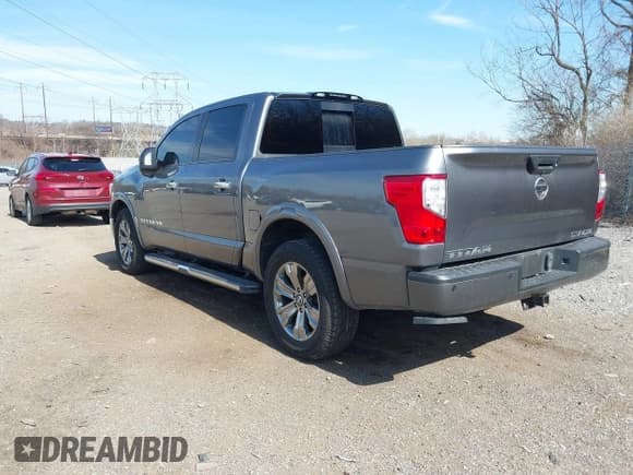 ✅ 2018 Nissan Titan SV • VIN: 1N6AA1E57JN551457 • Lot: 41790327. Listed on IAAI with 140,942 mi. Free auction sales archive from the USA and detailed vehicle history report at DreamBid. Image 3.