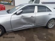 ✅ 2014 Cadillac CTS Luxury AWD • VIN: 1G6AX5S38E0147228 • Lot: 43601729. Listed on IAAI with 116,728 mi. Free auction sales archive from the USA and detailed vehicle history report at DreamBid. Image 6.