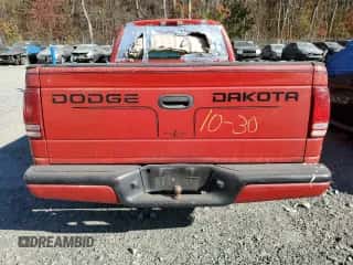 1999 Dodge Dakota SLT z VIN 1B7FL26X0XS233747, wystawiony jako Copart lot #78819034 z przebiegiem 231 948 mil mil oraz Szkoda całkowita • Salvage title. Historia ofert i sprzedaży dostępna na DreamBid. Obrazek 6.