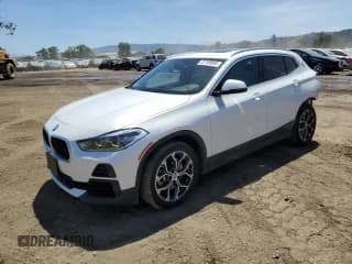 ✅ 2023 BMW X2 sDrive28i • VIN: WBXYH9C06P5V65784 • Лот: 57108985. Опубликован ранее на Copart с пробегом 37 113 миль. Бесплатный доступ к архиву аукционных продаж из США и подробный отчёт об истории автомобиля на DreamBid. Изображение 1.