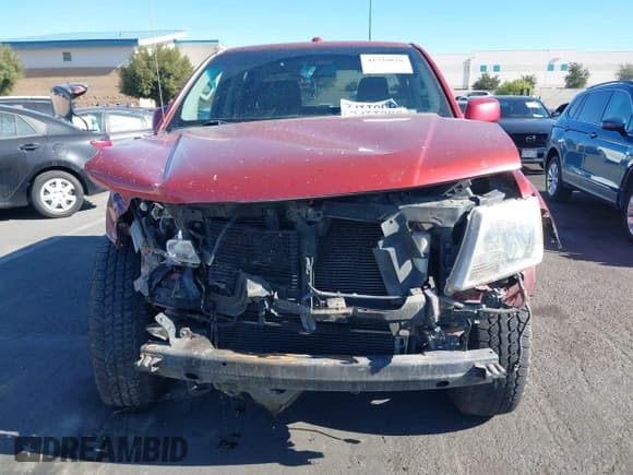 ✅ 2012 Nissan Frontier Pro-4X • VIN: 1N6AD0EV6CC433903 • Lot: 41329828. Listed on IAAI with 209,345 mi. Free auction sales archive from the USA and detailed vehicle history report at DreamBid. Image 13.