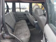 ✅ 1991 Jeep Cherokee • VIN: 1J4FJ88S0ML527479 • Lot: 42189457. Listed on IAAI with 321,419 mi. Free auction sales archive from the USA and detailed vehicle history report at DreamBid. Image 8.