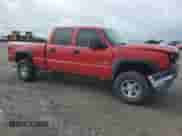 2005 Chevrolet Silverado 2500HD LT with VIN 1GCHK23215F888557, listed as a Copart auction lot 61552175 with 253,556 mi miles and Salvage title. Bid and sale history available at DreamBid. Image 4.