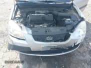 ✅ 2009 Kia Rio LX • VIN: KNADE223296459124 • Lot: 43130896. Wystawiony na IAAI z przebiegiem 129 998 mil. Bezpłatny archiwum sprzedaży aukcyjnych z USA i szczegółowy raport historii pojazdu na DreamBid. Zdjęcie 10.