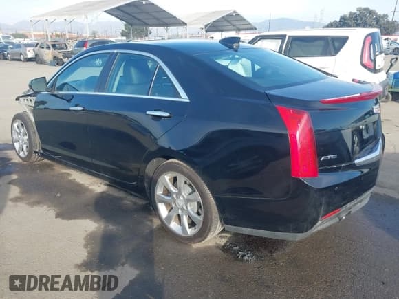 ✅ 2015 Cadillac ATS Luxury RWD • VIN: 1G6AB5RA3F0120667 • Lot: 41178133. Listed on IAAI with 39,673 mi. Free auction sales archive from the USA and detailed vehicle history report at DreamBid. Image 3.