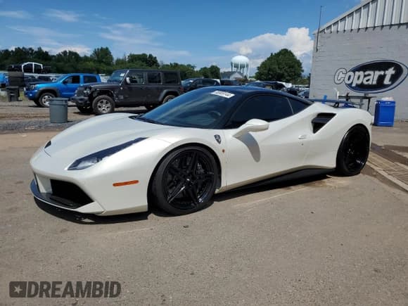 ✅ 2016 Ferrari 488 • VIN: ZFF79ALA0G0215601 • Лот: 66909144. Опубликован ранее на Copart с пробегом 6 203 миль. Бесплатный доступ к архиву аукционных продаж из США и подробный отчёт об истории автомобиля на DreamBid. Изображение 1.