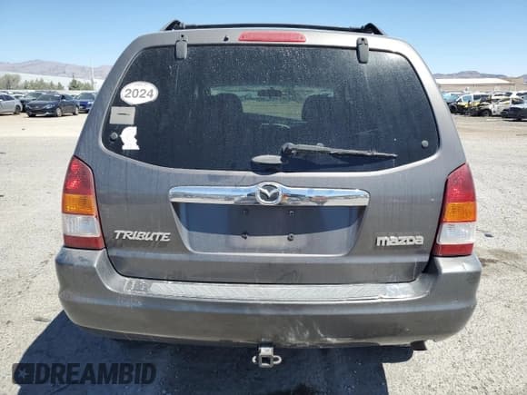 ✅ 2003 Mazda Tribute ES • VIN: 4F2CZ06113KM34892 • Lot: 66942765. Listed on Copart with 240,643 mi. Free auction sales archive from the USA and detailed vehicle history report at DreamBid. Image 6.