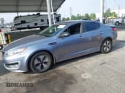 ✅ 2011 Kia Optima EX Hybrid • VIN: KNAGM4AD1B5006517 • Lot: 42598681. Listed on IAAI with 111,574 mi. Free auction sales archive from the USA and detailed vehicle history report at DreamBid. Image 2.