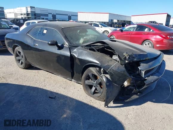 2012 Dodge Challenger SXT Plus with VIN 2C3CDYAG6CH176860, listed as a IAAI auction lot 43584841 with Not provided miles and . Bid and sale history available at DreamBid. Image 1.